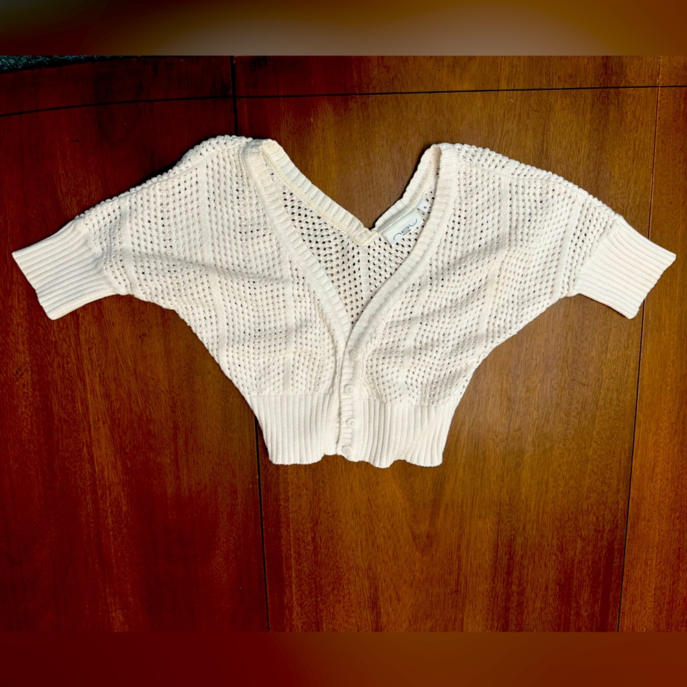 Cutest white half-sweater. Small. Never worn. Brand new. Smells nice and clean